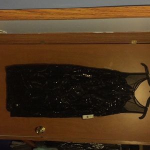 Adrianna Papell dress.